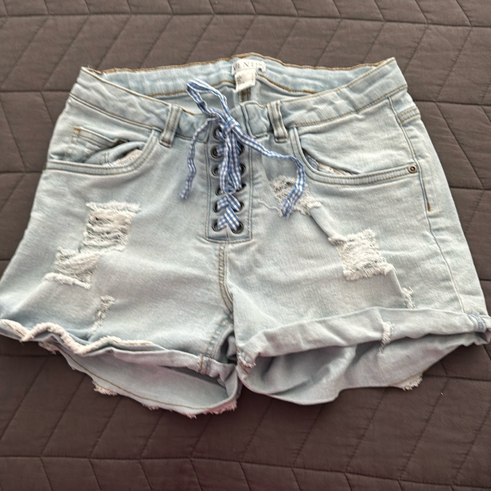 Cute super stretchy and comfortable jean shorts with lace up tie